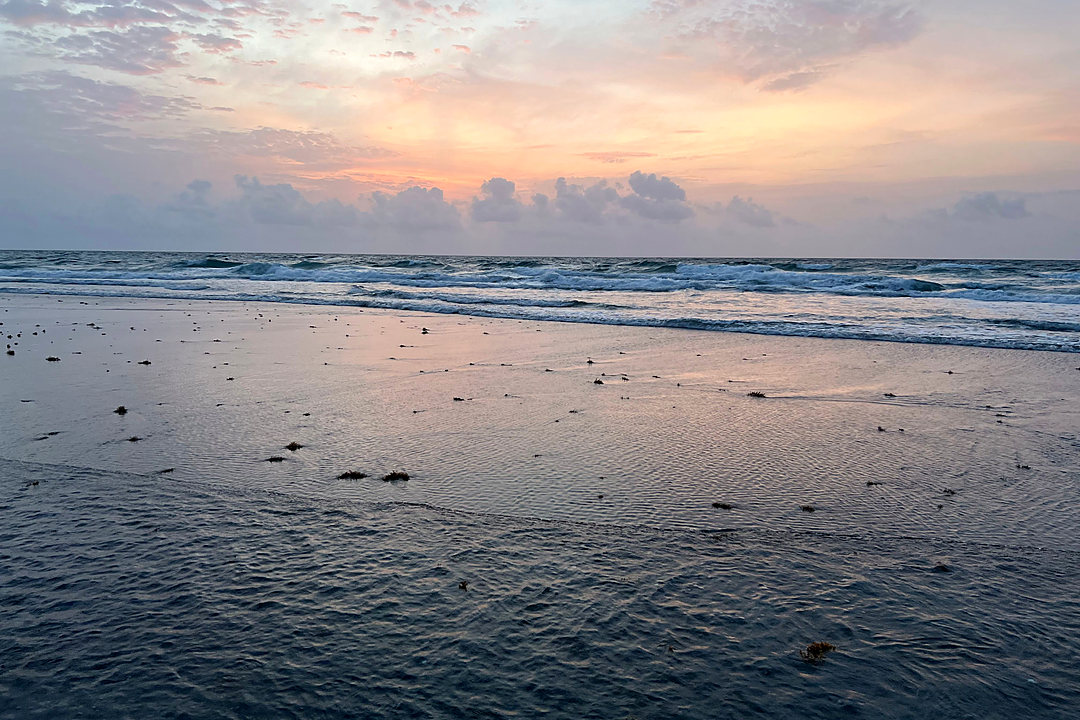Sunset over the ocean at Boca Raton beach